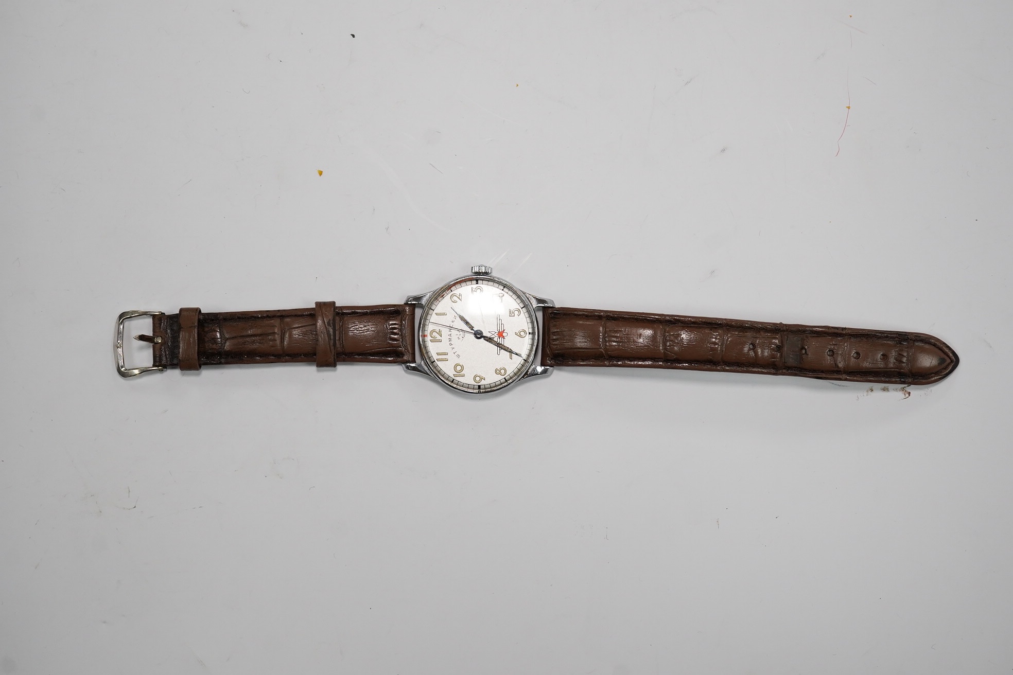 A gentleman's steel Russian manual wind wrist watch, the dial inscribed Kupoba, with Arabic dial, case diameter 34mm. Condition - poor